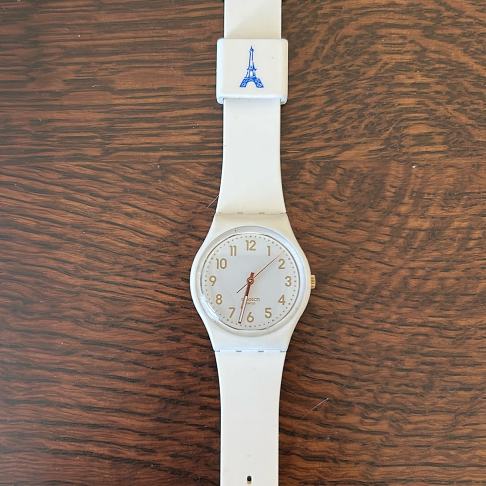 White Swatch watch, with Eiffel Tower